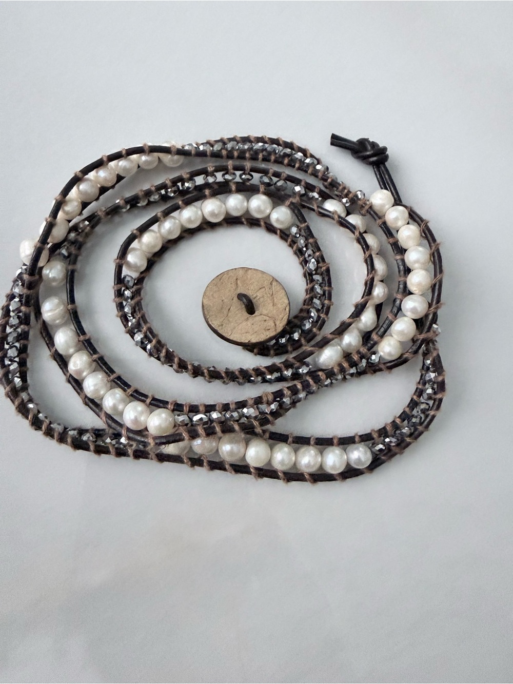 Wrap around pearls metal beads leather rope bracelet.